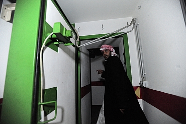 A Libyan man walks through a door in the extensive underground tunnels