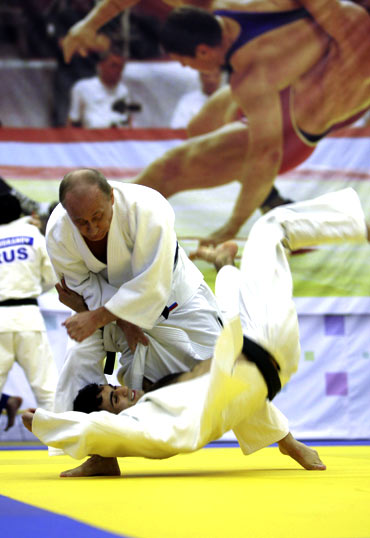 Putin takes part in a judo training session at the Moscow sports complex in St. Petersburg