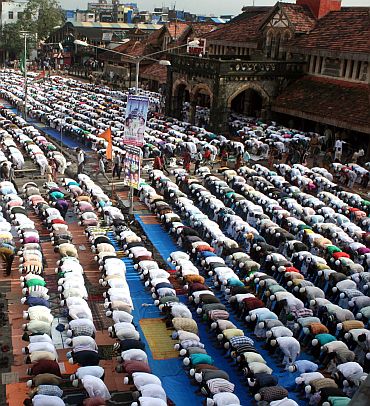 Muslims offering prayers outside the Bandra railway station, Mumbai