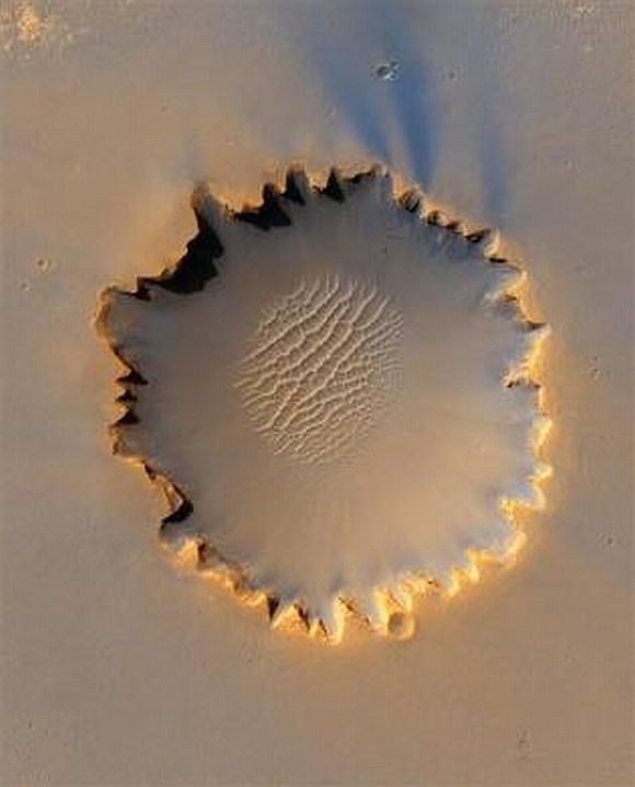 Mars' Victoria Crater at Meridiani Planum in an image taken by NASA's High Resolution Imaging Science Experiment camera and released October 6, 2006.
