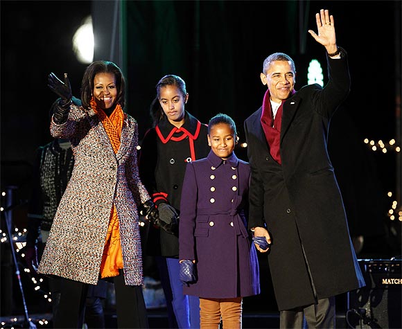 President Barack Obama and the first family arrive to take part in the National Christmas Tree Lighting ceremony in Washington