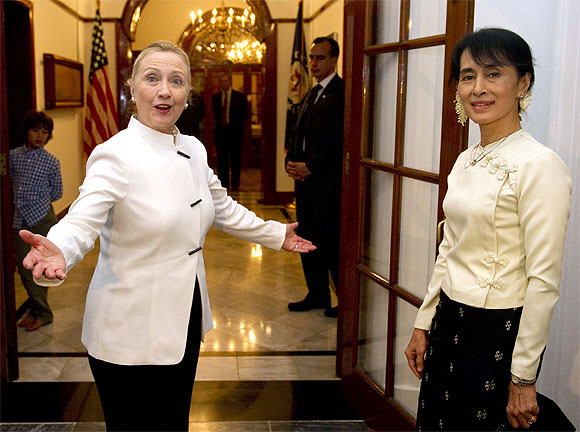 US Secretary of State Hillary Clinton and pro-democracy leader Aung San Suu Kyi attend a dinner at the US Chief of Mission residence in Yangon