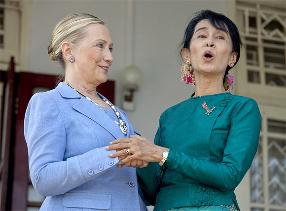 Clinton and Suu Kyi share a joke after their talks on Friday