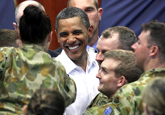 US President Barack Obama shakes hands with Australian troops while at the RAAF Base in Darwin. From next year, US troops will operate out of of Darwin to respond quickly to crisis in Southeast Asia, if any