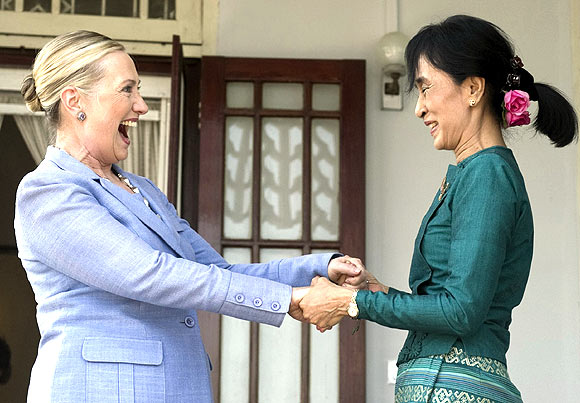Pro-democracy leader Aung San Suu Kyi and US Secretary of State Hillary Clinton speak after meeting at Suu Kyi's residence in Yangon on December 2. Suu Kyi welcomed on Friday US engagement with Myanmar, saying she hoped it would set her long-isolated country on the road to democracy
