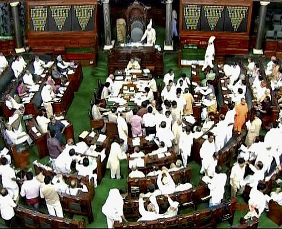 Shinde tables Telangana Bill in Rajya Sabha amid ruckus