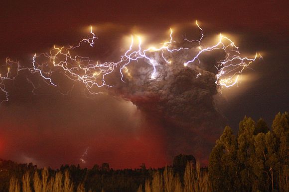 Lightning flashes around the ash plume above the Puyehue-Cordon Caulle volcano chain near Entrelagos June 5, 2011