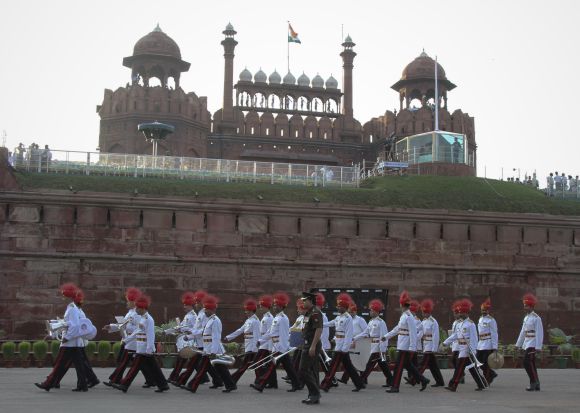 Soldiers march past the Red Fort during a rehearsal for India's Independence Day celebrations in Delhi.