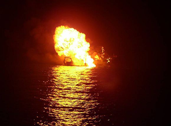 A handout photo shows a pirate vessel after it was blown up by an Indian Navy warship in the Gulf of Aden