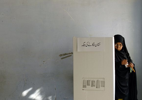 File image of a woman casting her vote during the 2008 general polls in Pakistan