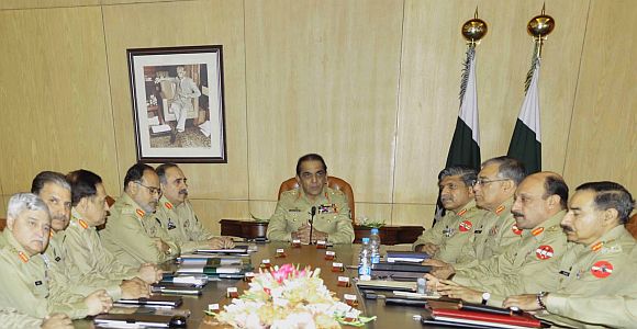 File photo shows Kayani chairing a meeting of top generals