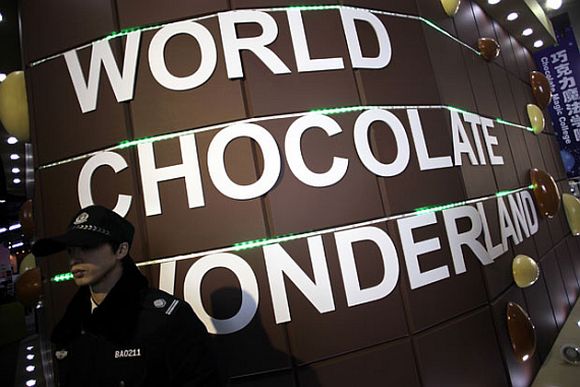 A security guard stands guard at a new chocolate theme-park in Shanghai