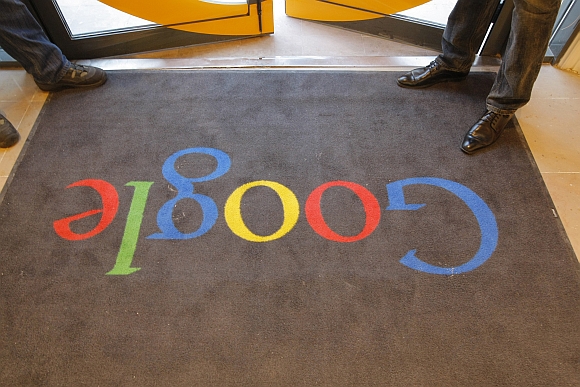 A Google carpet is seen at the entrance of the new headquarters of Google France