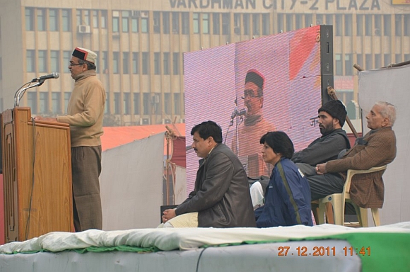 Prashan Bhushan speaks at the rally in New Delhi