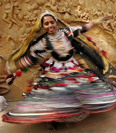 Folk dancers from Rajasthan perform on the eve