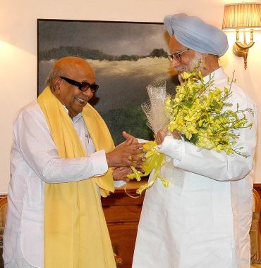 Prime Minister Manmohan Singh with DMK chief M Karunanidhi