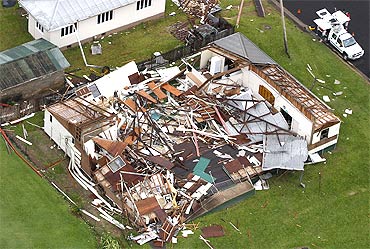 A house lies in ruins after Cyclone Yasi passed the northern Australian town of Tully