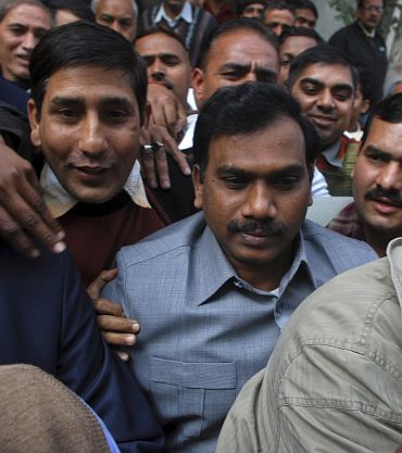 Former telecommunications minister A Raja leaves CBI headquarters in New Delhi as he was arrested for his alleged role in the 2G Spectrum scam