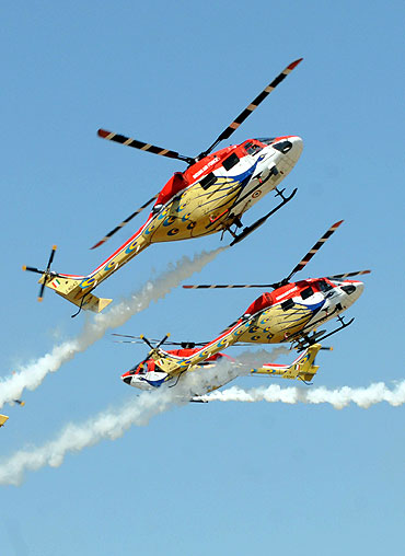 Sarang team perform during Aero India 2011 at Yelahanka Airforce station in Bangalore