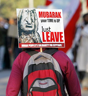 An activist from the All India Students Association (AISA) attends a protest against Egypt's President Hosni Mubarak outside the Egyptian embassy in New Delhi