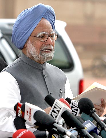 India's Prime Minister Manmohan Singh addresses the media