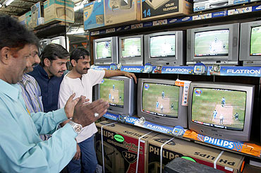 Pakistani fans watch a one-day match against India in Karachi.