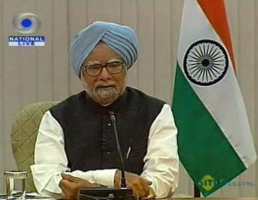 Video grab shows Prime Minister Manmohan Singh interacting with TV Editors at his residence