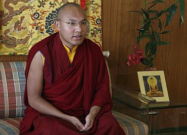 Karmapa Lama speaks during an interview in Dharamsala