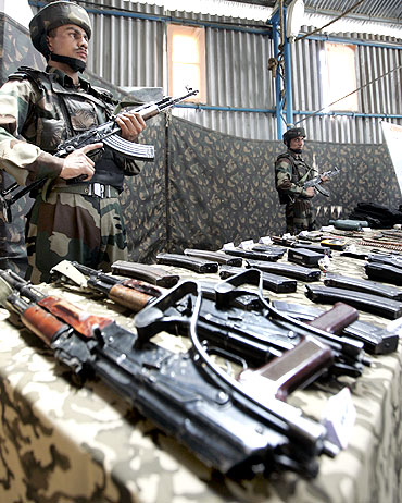 Arms and ammunition seized from LeT militants displayed at Kupwara in Kashmir
