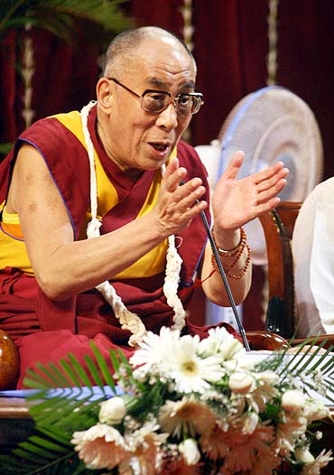 The Dalai Lama interacts with students at the Mumbai university