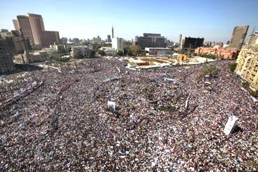 Egyptian pro-democracy supporters gather in Tahrir Square in Cairo on Friday