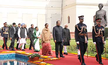 President Pratibha Patil, Prime Minister Manmohan Singh, Speaker Meira Kumar, Rajya Sabha Chairman Hamid Ansari, Union Minister Pawan Kumar Bansal  being led in a ceremonial procession to Parliament for the budget session