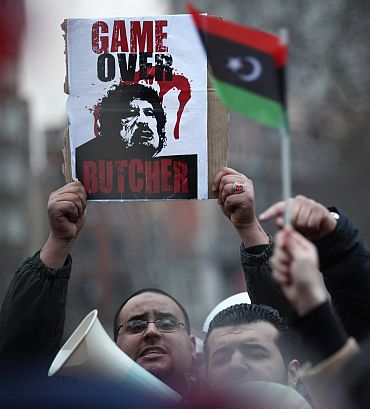 Gaddafi regime totters; 'Massacre' in Tripoli