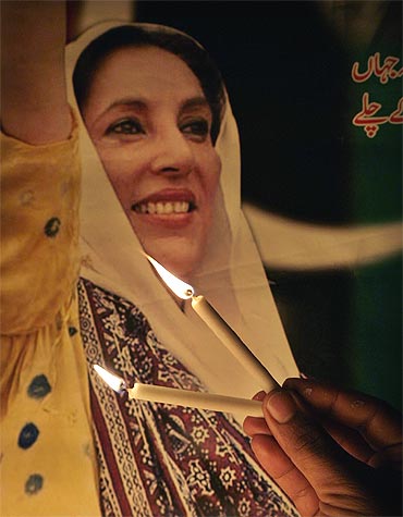 Benazir Bhutto's supporters light candles to celebrate her birthday in Islamabad.