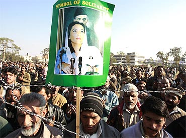Benazir Bhutto's supporters gather for a memorial in Rawalpindi.