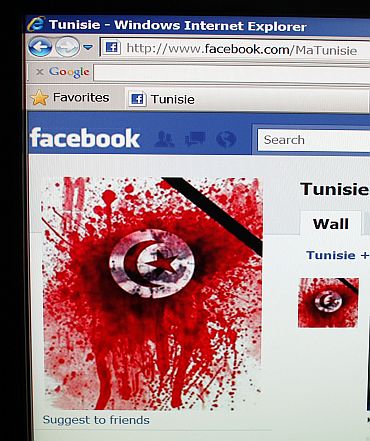 A student-run facebook page shows an image depicting the Tunisian national flag smeared in red, representing blood as seen on a computer screen