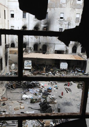A state security building taken over by anti-government protesters is seen in Benghazi city, Libya