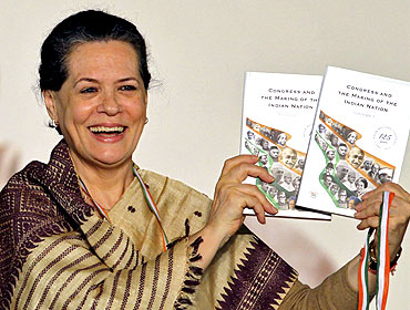 Congress chief Sonia Gandhi releases a book celebrating 125 years of the party during the 83rd plenary session in New Delhi