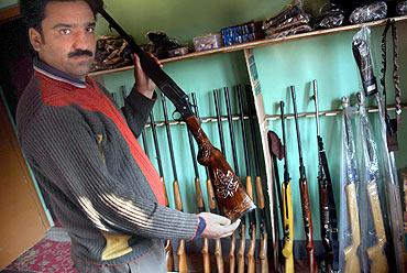 A intricately carved gun made at the Subhana Gun factory