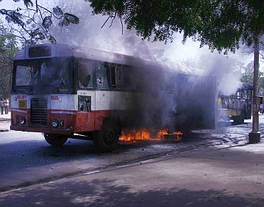 A state transport bus set on fire by Telangana activists