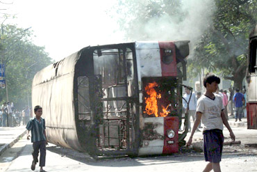 Pro-Telangana protestors burn a bus in Hyderabad on Friday