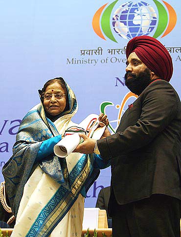 Upjit Singh Sachdev getting the award