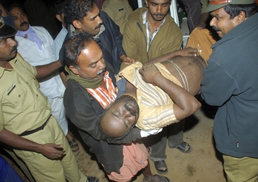 A devotee who was injured after the stampede is taken to a hospital at Kumily in Kerala