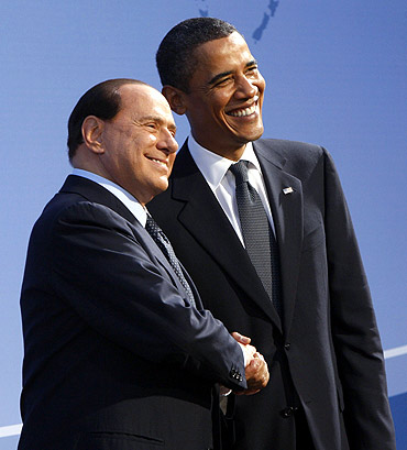 Obama greets Italian Prime Minister Silvio Berlusconi