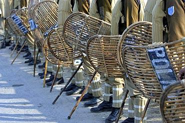 Policemen stand guard in Lakhanpur in Jammu and Kashmir