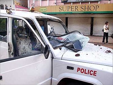 File Photo: A police vehicle that bore the brunt of protestors' ire