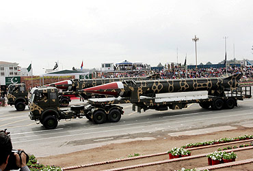Pakistani military trucks carry the long range nuclear-capable surface-to-surface Ghauri ballistic missile during the National Day parade