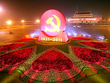 A huge emblem of the CPC is seen at Tian'anmen Square in Beijing