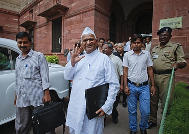 Hazare with civil society member Arvind Kejriwal outside the Parliament in New Delhi
