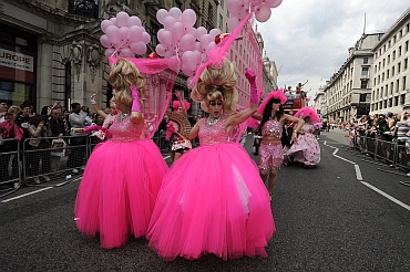 Participants take part in the annual Pride London parade